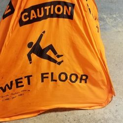 Used Pop-up Caution Wet Floor Sign