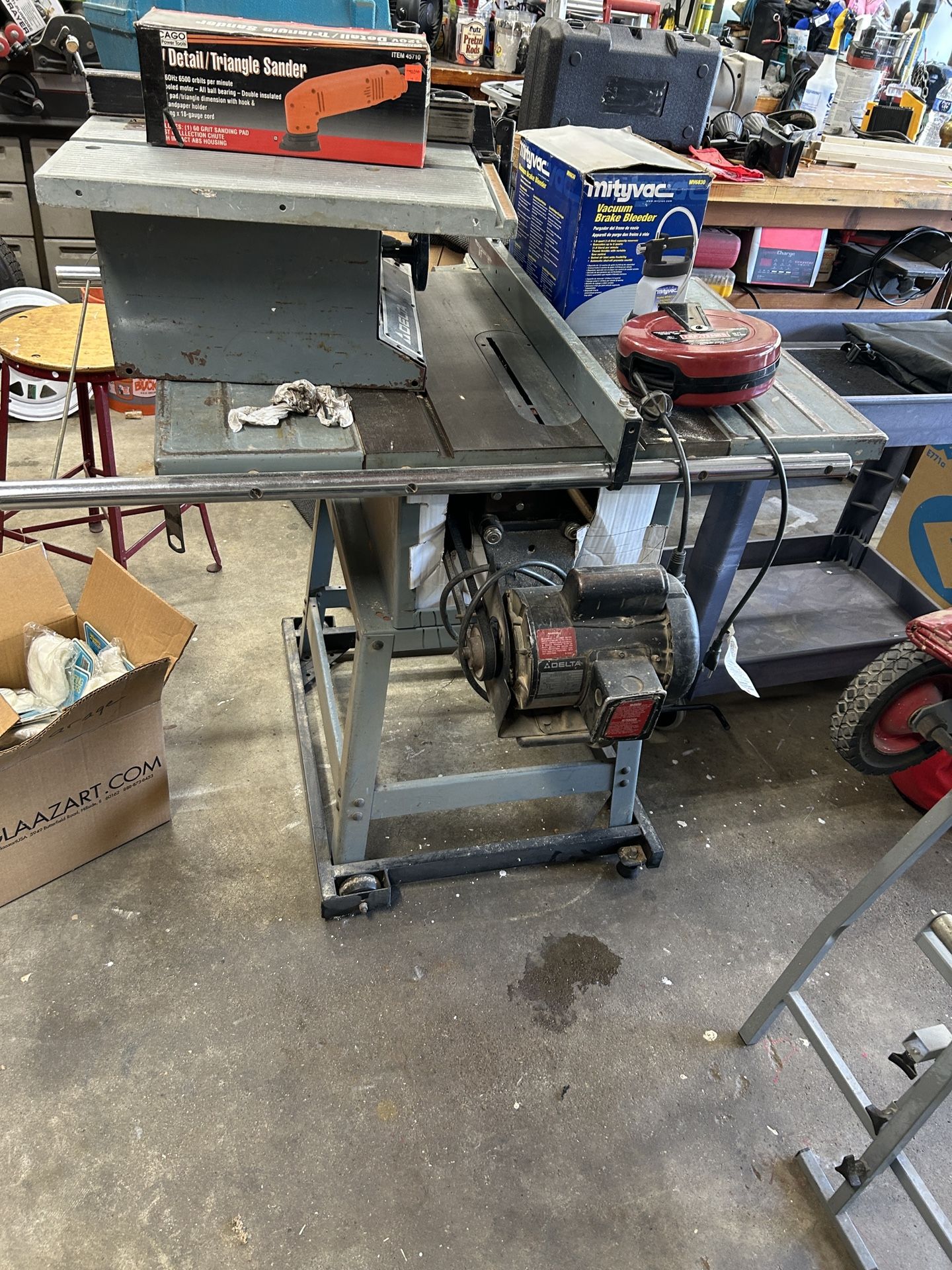 Garage Sale Filled With Tools And Many Other Items.