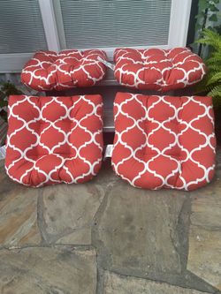 New set of burnt orange patterned outdoor cushions