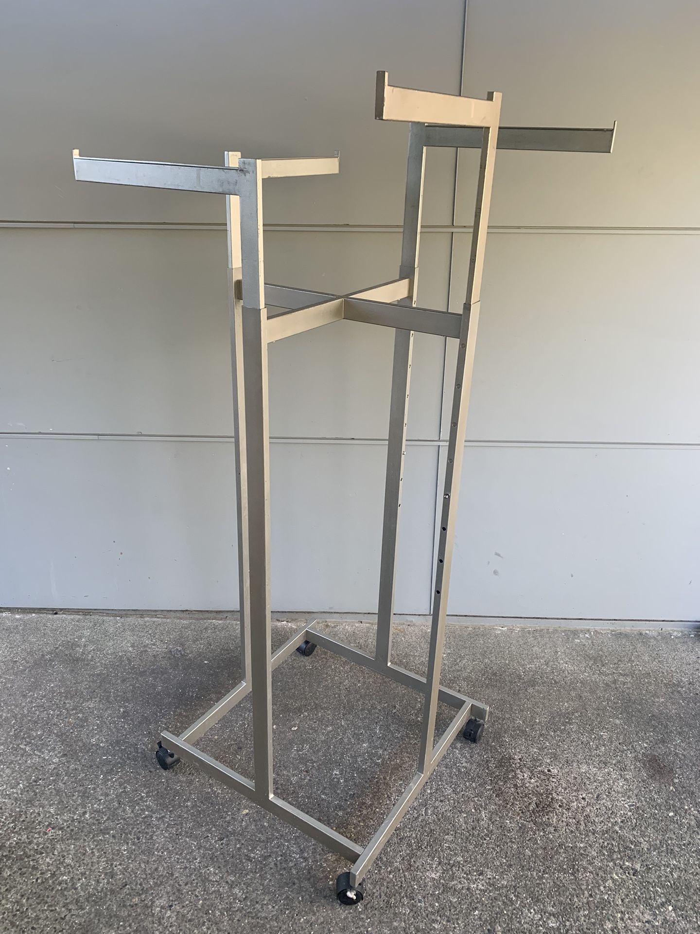 4-way commercial metal clothing rack.