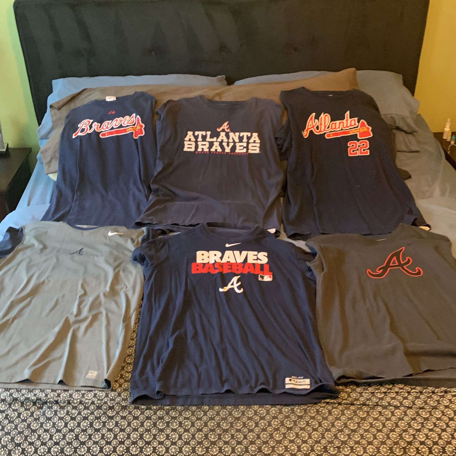 Six Atlanta Braves T-shirts.