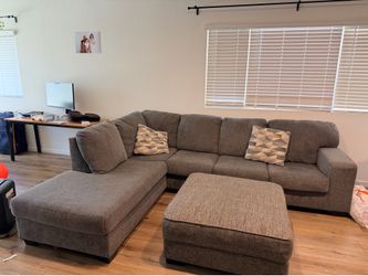 Moderately used sectional w/ Xtra Large ottoman + Storage