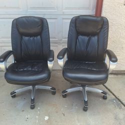 Black faux leather office chairs $25 EACH
