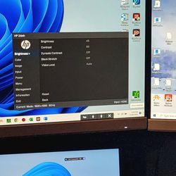Two - 24 HPmh FHD Monitors w/ HUANUO Dual Monitor Stand