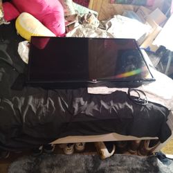  42 in.LG TV  with mounting bracket 