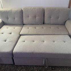 Light Gray fabric sectional sofa with pullout sleeper Sofa bed reversible chaise 