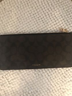 Brand new Coach hand clutch