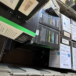 Bin of boxes of toner cartridges for printers