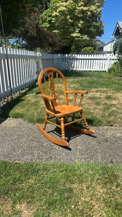 Child’s wooden rocking chair