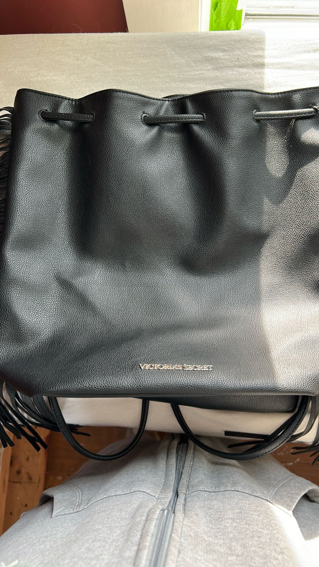 Backpack Fringed Good Size. Black With Fringe On Both Sides. New And Never Used.