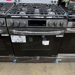 Brand new LG Charcoal slidden in 5 burner range stove 