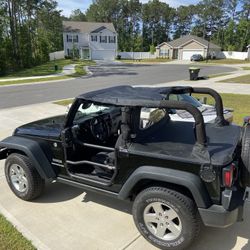Two-door Jeep JK summer top set up/duster