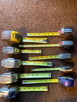 Tin used tape measures good condition all for $30