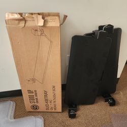 Store under-desk keyboard tray. 