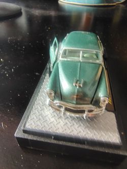 Teal Classic Car Diecast Model on Display Base