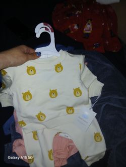 Baby clothes baby carrier and baby bottles individual or all as a bundle deal for 70