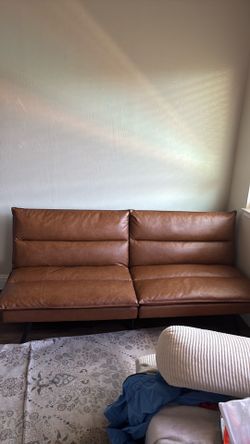 Brown faux leather futon
