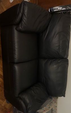 Black Leather Two-Seater Sofa black leaver couch