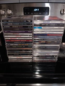 40 COUNTRY AND ROCK CDS