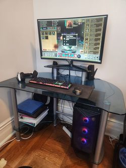 Glass computer desk with monitor raiser shelf