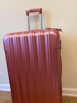 Brand new 20 inch pink carry on luggage