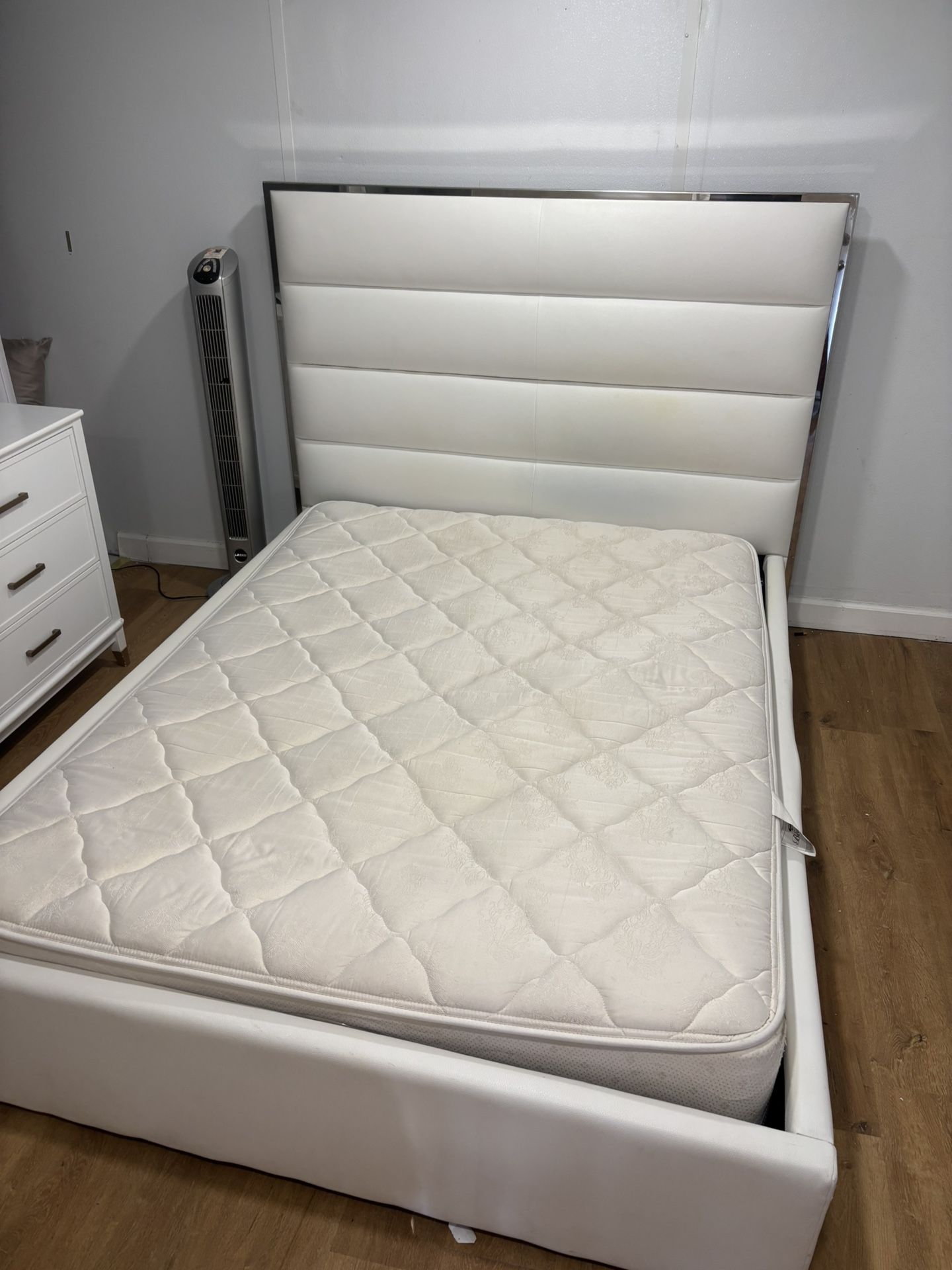 queen bed and end table