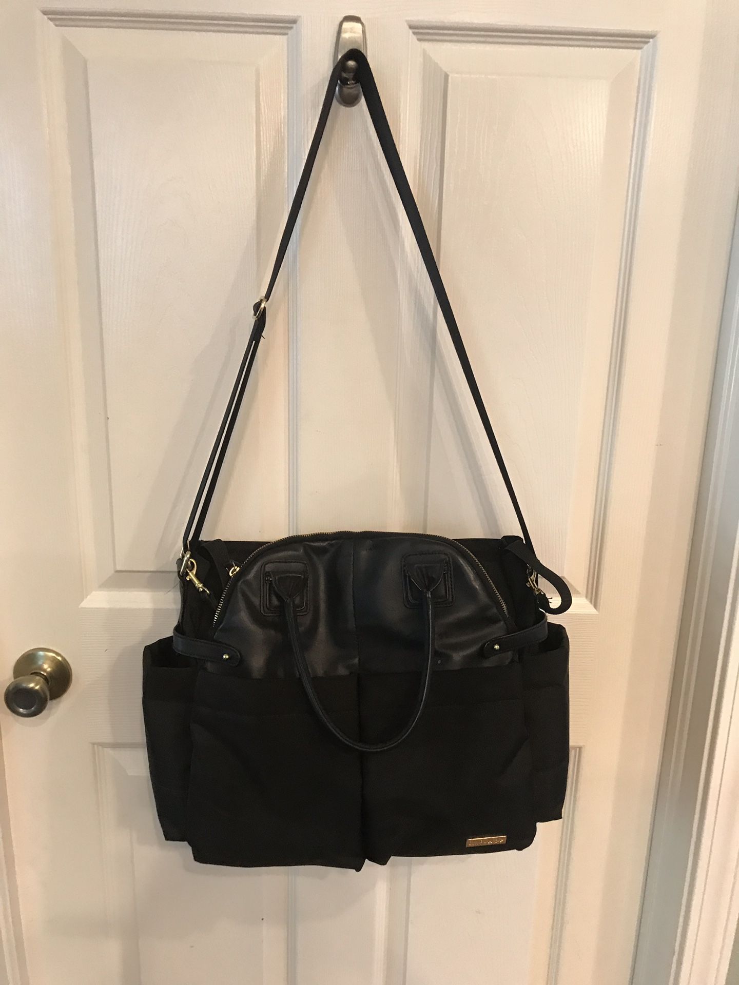 Skip Hop Black Diaper Bag with baby changing pad