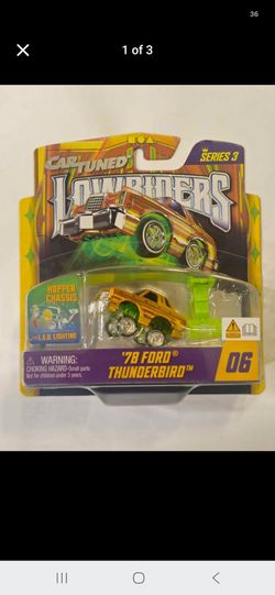 CAR TUNED DIECAST METAL . LOWRIDERS SERIES 3 . HOPPER CHASSIS . WITH LED UNDER GLOW LIGHTING . 1978 FORD THUNDERBIRD LOWRIDER .
