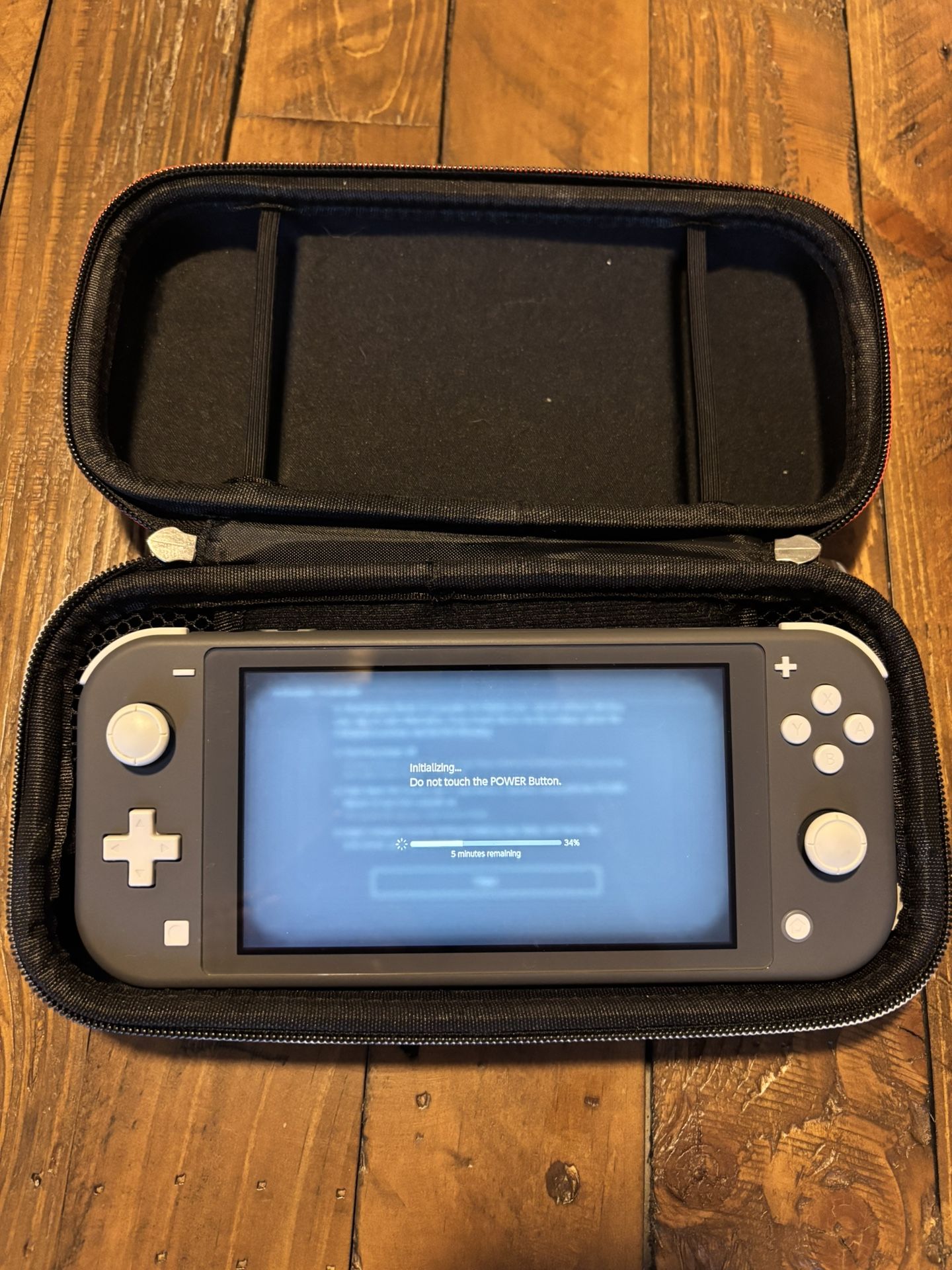 Black Switch Lite + Charger/Carrying Case - NO GAMES