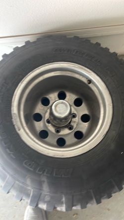 Rims one tire six lug fit for truck very light one has curb check one has tire all rims here take all for $140 obo