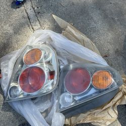 2004 Altima Rear Factory Tail Lights Set