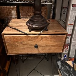 Mid-century modern nightstand / end table wooden top with metal legs.. does show a little bit of use but overall my sha