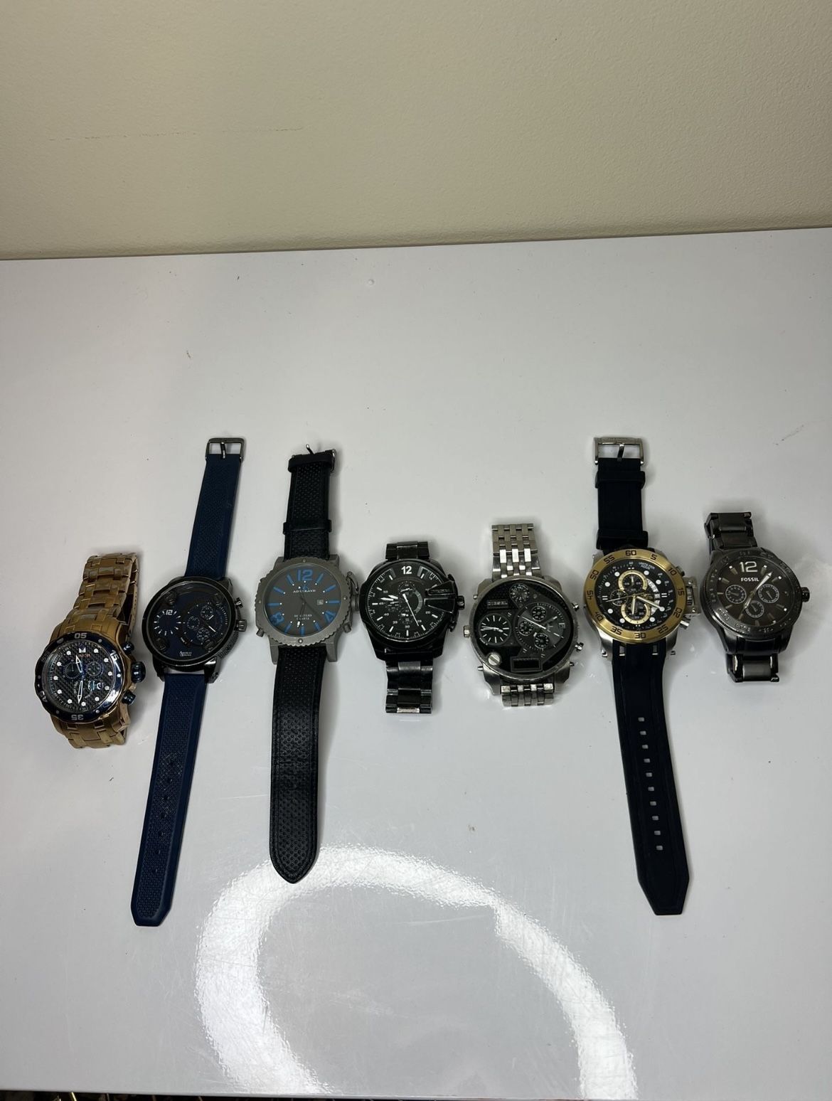 watches of brands such as Invicta;Fossil ;Diesel;adde kaye;