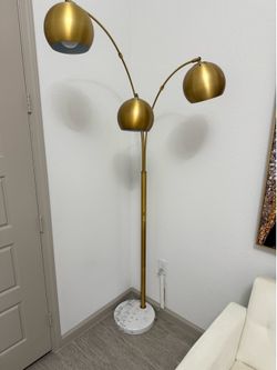 Standing gold lamp
