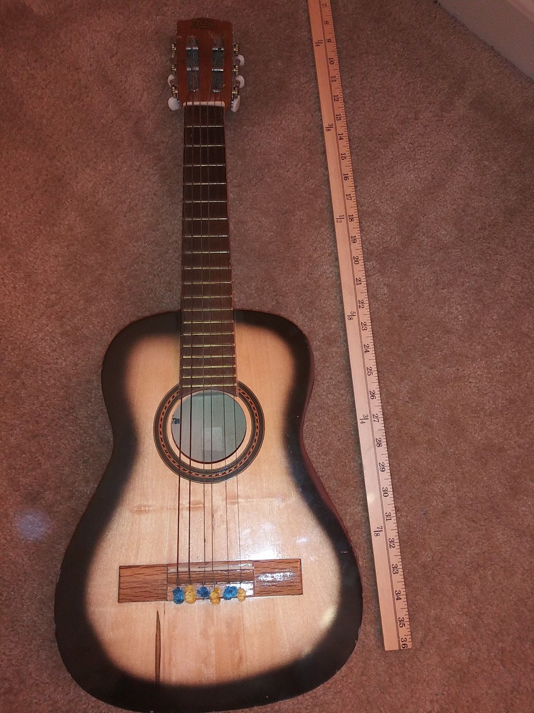 Small 6 string acoustic guitar