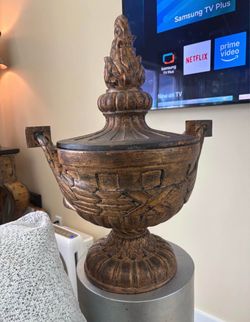 Gorgeous one of a kind centerpiece is actually an urn I have it as a decorative accent￼