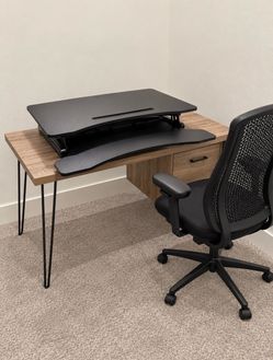 Working desk and riser. Chair not included