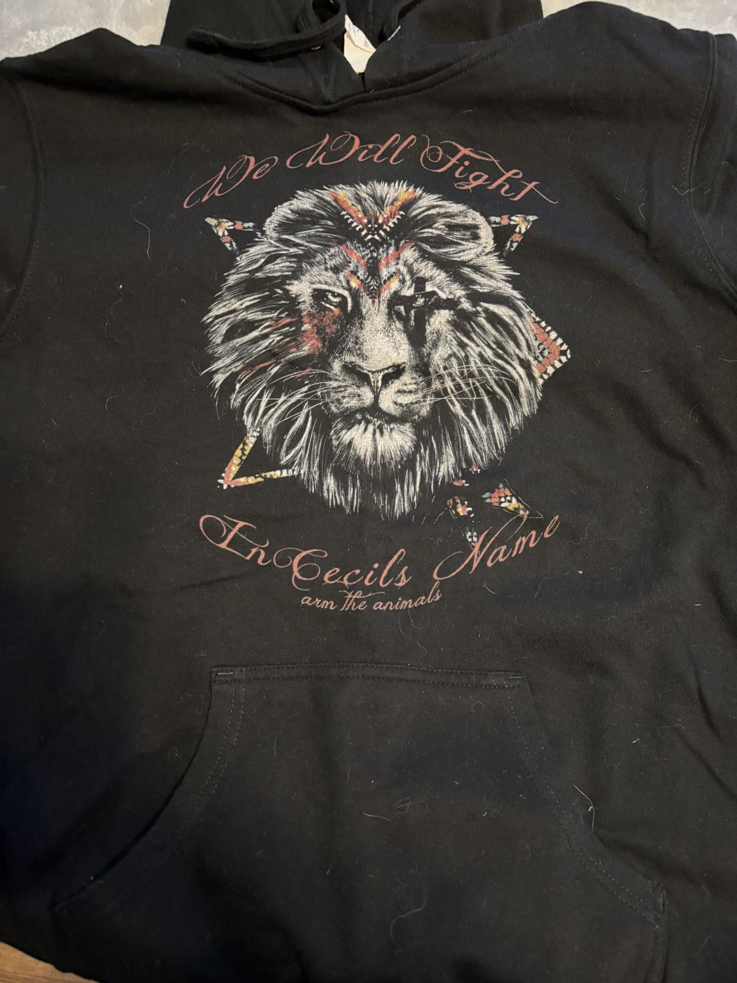 We Will Fight In Cecil’s Name Hoodie. Medium