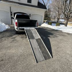 Ramp - PAIR of 8 ft long folding aluminum ramps - $550 on Amazon