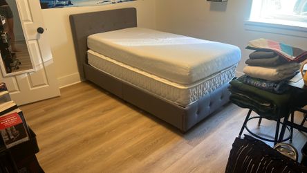 Twin Bed with two like new mattresses