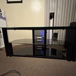 Smoke glass tv stand 70” heavy weight.