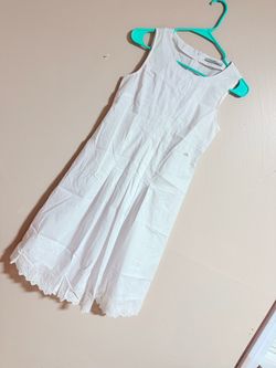 White Sleeveless Dress with Eyelet Hem