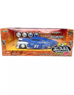 1:24 scale diecast model car of a 1951 Mercury Custom from the Jada Toys Von Dutch Garage series