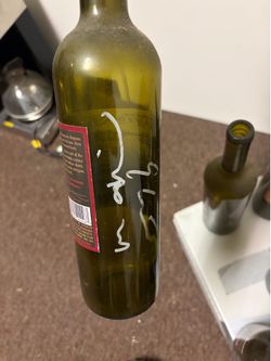Signed Maynard James Keenan wine bottles