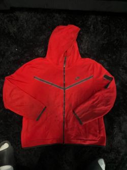 Red Nike Tech-style full-zip hoodie