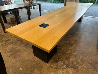 Heavy duty desk with steel legs and hidden outlet on top Heavy duty desk with steel legs and hidden outlet on top