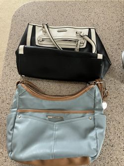Two Used Handbags 