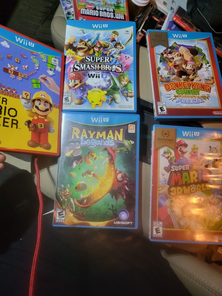 5 Nintendo Wii U Games.3 mario .1 donkey Kong 1 Rayman