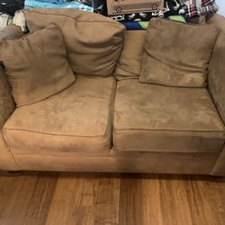 Tan loveseat