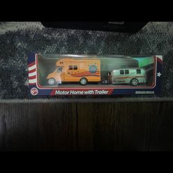 Die cast toy motor home with trailer 